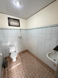 Koupelna v ubytování Kajeng Bungalow