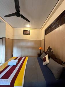 Postel nebo postele na pokoji v ubytování Kajeng Bungalow
