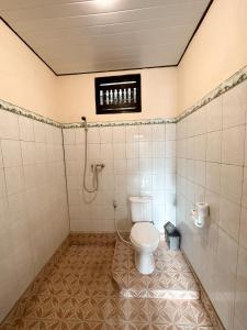 Koupelna v ubytování Kajeng Bungalow