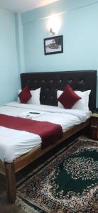 Postel nebo postele na pokoji v ubytování Hotel Pearl Retreat