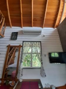 a small room with a window in a house at Dins Nature Villa in Elgiriya
