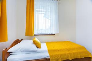 Posteľ alebo postele v izbe v ubytovaní Willa Pod Wierchem
