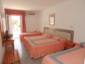 Postel nebo postele na pokoji v ubytování Virgen del Mar Holidays + 37 fotografií