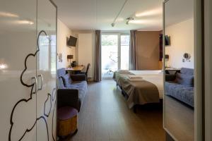 Postel nebo postele na pokoji v ubytování Hotel Restaurant 'de Vossenberg' + 37 fotografií