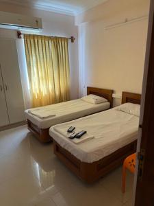 Postel nebo postele na pokoji v ubytování Hotel GARISHPARK
