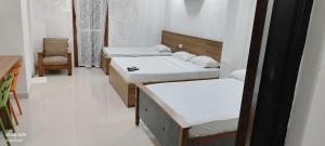 Postel nebo postele na pokoji v ubytování Hotel GARISHPARK