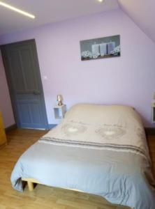 a bedroom with a bed in a room at Nouveau loft à moins de 100m du lac classé 2 étoiles in Gérardmer