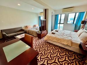 Postel nebo postele na pokoji v ubytování Faina Homestay SCSP Ming Garden Resident Kota Kinabalu + 19 fotografií