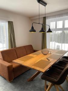 Posezení v ubytování Apartmán pod Dubem + 9 fotografií