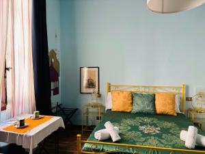 A bed or beds in a room at Affittacamere Firenze in Libertà Parterre
