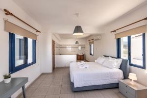 Postel nebo postele na pokoji v ubytování Diana Seaside Villas