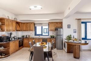 Kuchyň nebo kuchyňský kout v ubytování Diana Seaside Villas + 37 fotografií