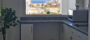 Η κουζίνα ή μικρή κουζίνα στο Beautiful Apartment in Egyptian Experience Resort