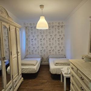 Posteľ alebo postele v izbe v ubytovaní Millan Astray + 3 fotografie