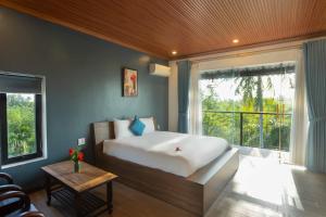 Postel nebo postele na pokoji v ubytování Phúc Villa Hoi An + 25 fotografií
