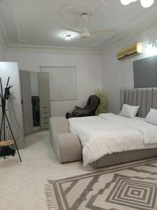 A bed or beds in a room at Lifespans resort منتجعات عمر