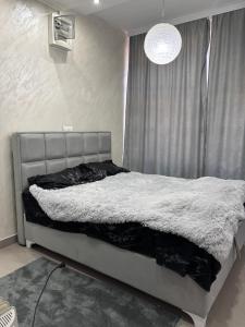 Postel nebo postele na pokoji v ubytování Stan na dan Loznica