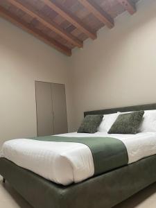 Postel nebo postele na pokoji v ubytování The Look Franciacorta