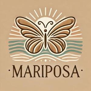 Een vlinder bevindt zich op het water met de tekst 'mariposa'. bij Ferienwohnung Mariposa in Böbing