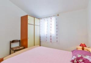 Postel nebo postele na pokoji v ubytování Apartment Kosta