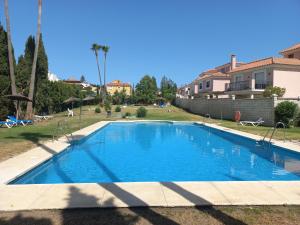 a swimming pool in the yard of a house at Place-To-Relax in San Luis de Sabinillas +5 photos