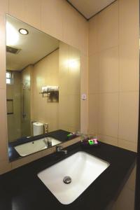 Ένα μπάνιο στο Hotel Dafam Rio