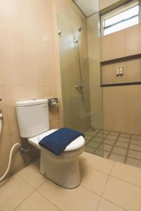 Ένα μπάνιο στο Hotel Dafam Rio