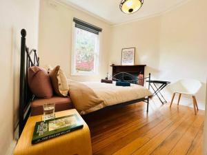 Χώρος καθιστικού στο Hobart Heritage House Near City