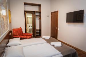 Letto o letti in una camera di Tea for Two Hotel