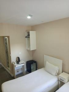 Postel nebo postele na pokoji v ubytování Rota Star Hotel Beyoğlu
