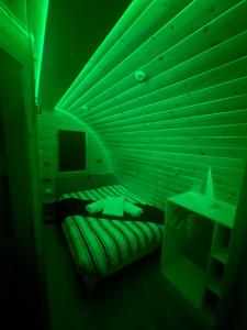 Voodi või voodid majutusasutuse Tra na Mbó Glamping Pod toas