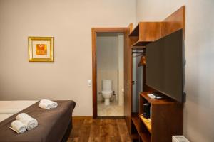 Letto o letti in una camera di Tea for Two Hotel