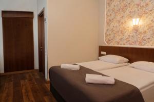 Letto o letti in una camera di Tea for Two Hotel
