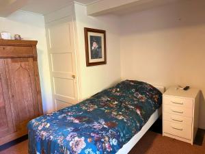 Postel nebo postele na pokoji v ubytování B&B Catharinenburg Golf & Wellness
