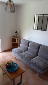 Predel za sedenje v nastanitvi Location privative dans villa