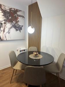 A seating area at Memento Apartman Divcibare