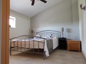 a bedroom with a bed with white sheets and a window at Great apartment in Arboleas in Arboleas +19 photos