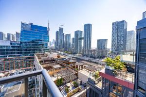 a view of a city skyline with tall buildings at PARC LOFT Penthouse with 4bd-WFH-PS5-CN Tower Views in Toronto