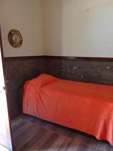 Postel nebo postele na pokoji v ubytování Los Tulipanes