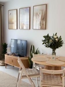 Khu vực ghế ngồi tại Apartamento en Mogro. La Pizca.