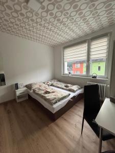 Postel nebo postele na pokoji v ubytování Apartmán ve městě Pernink pro 2 osoby