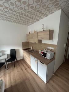 Kuchyň nebo kuchyňský kout v ubytování Apartmán ve městě Pernink pro 2 osoby