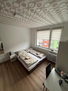Postel nebo postele na pokoji v ubytování Apartmán ve městě Pernink pro 2 osoby