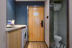 Koupelna v ubytování 利兹高空影音酒店 + 14 fotografií