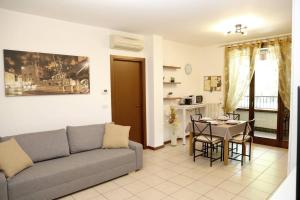 a living room with a couch and a table at MIKY'S HOME in Castenaso