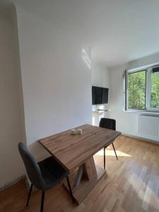 TV a/nebo společenská místnost v ubytování Neue Wohnung neben der MedUni und dem LKH