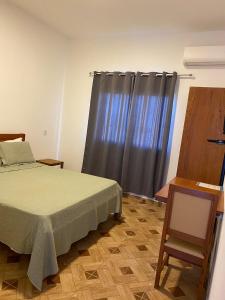 Katil atau katil-katil dalam bilik di Aguazul Hotel