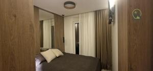 Voodi või voodid majutusasutuse Mateos toas