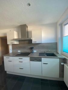 Kuchyň nebo kuchyňský kout v ubytování Schöne Anliegerwohnung