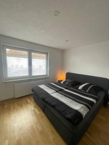 Postel nebo postele na pokoji v ubytování Schöne Anliegerwohnung
